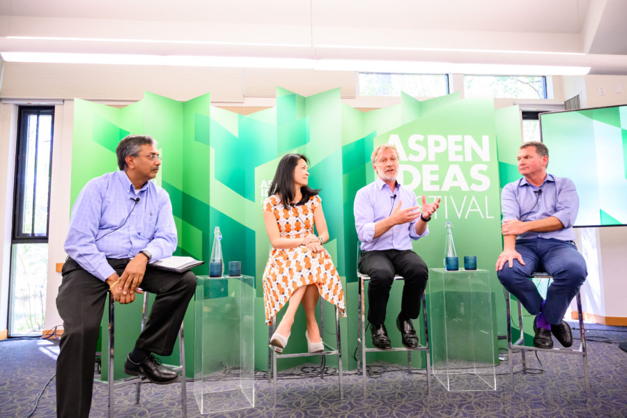 Four people are on stage at the aspen ideas festival