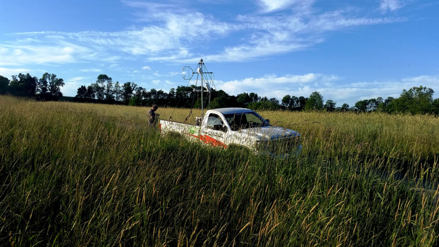 a truck in the middle of a field