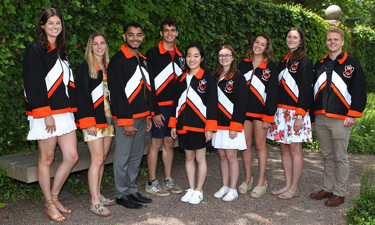 Princeton students pose in their class robes.