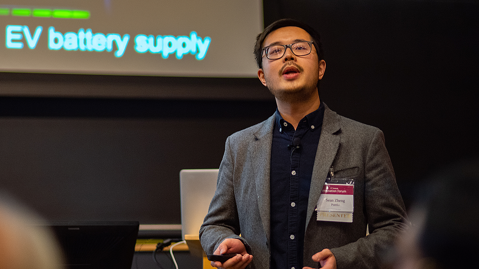 Sean Zheng takes center stage to present his first place-winning team's innovation at the 17th annual Innovation Forum hosted by the Keller Center. (Photo by Bumper DeJesus)