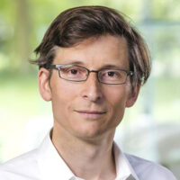 headshot of ian bourg