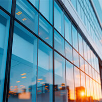 glass building at sunset