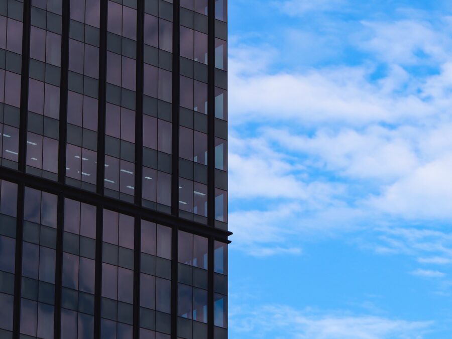 A building and a cloudy sky.