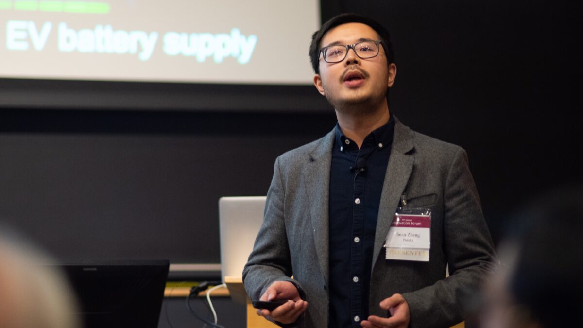 A man presents on a technology for lithium extraction.
