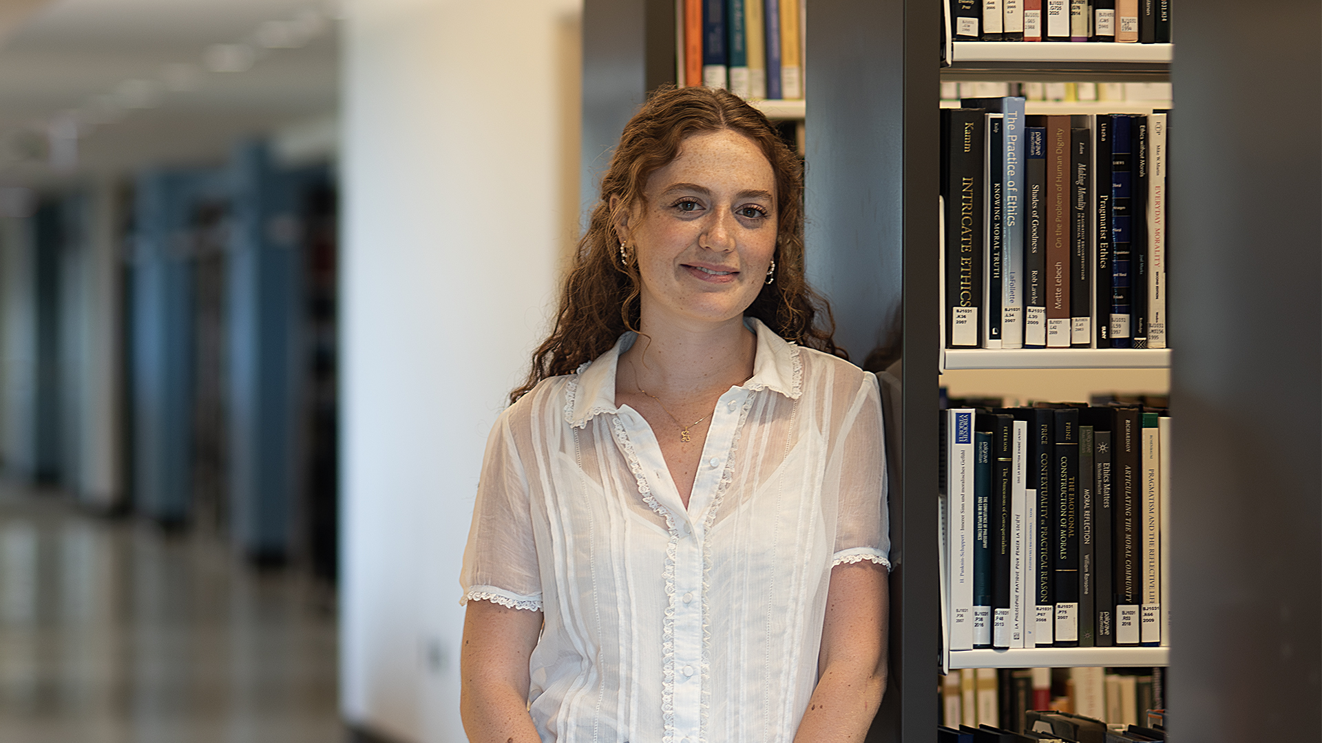 Young woman in a library