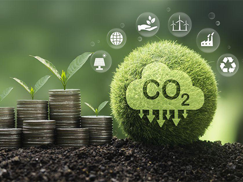 A green, grass-textured sphere with "CO2" icons sits on soil beside stacks of coins and sprouting plants, symbolizing environmental sustainability and growth.