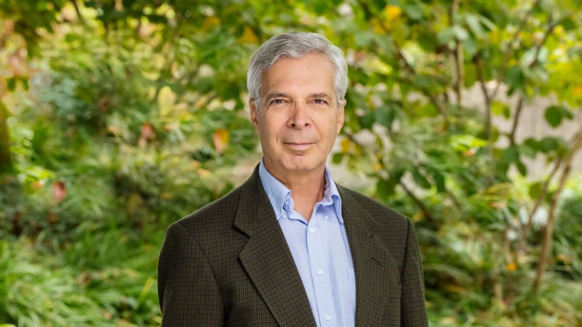 Portrait of Peter Jaffé against greenery
