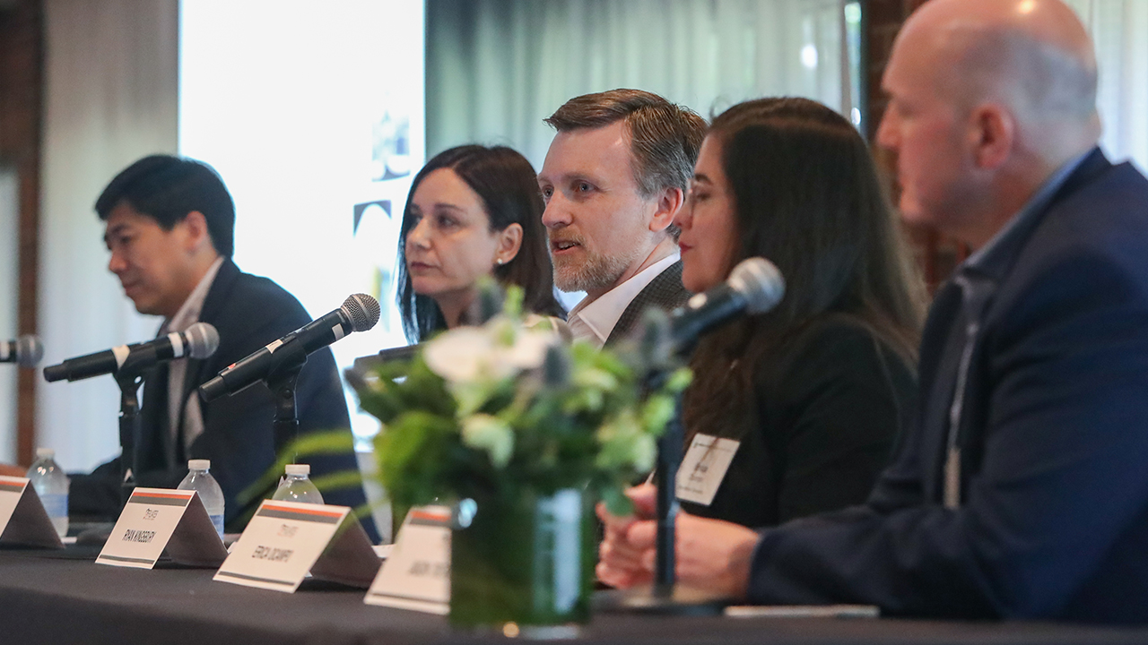 A group of people on a panel