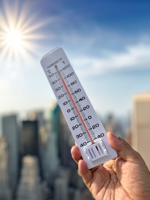A thermometer showing high temperatures